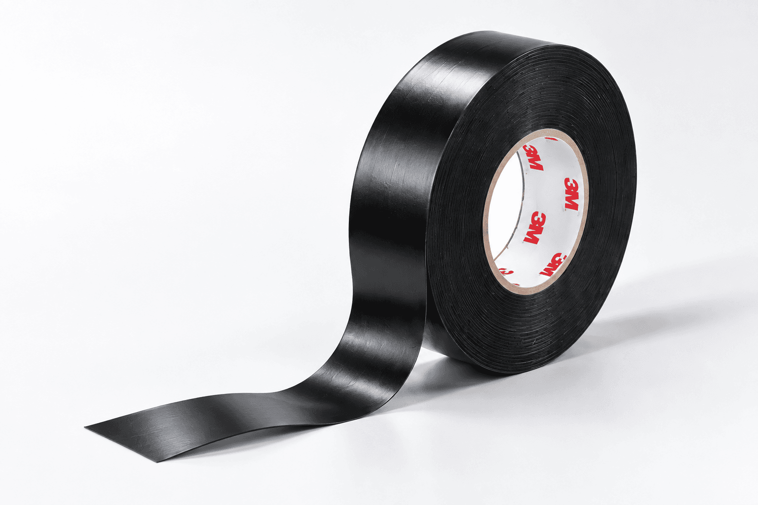 Illustrative black Scotch Super 33+ vinyl tape roll with a smooth unwound ribbon